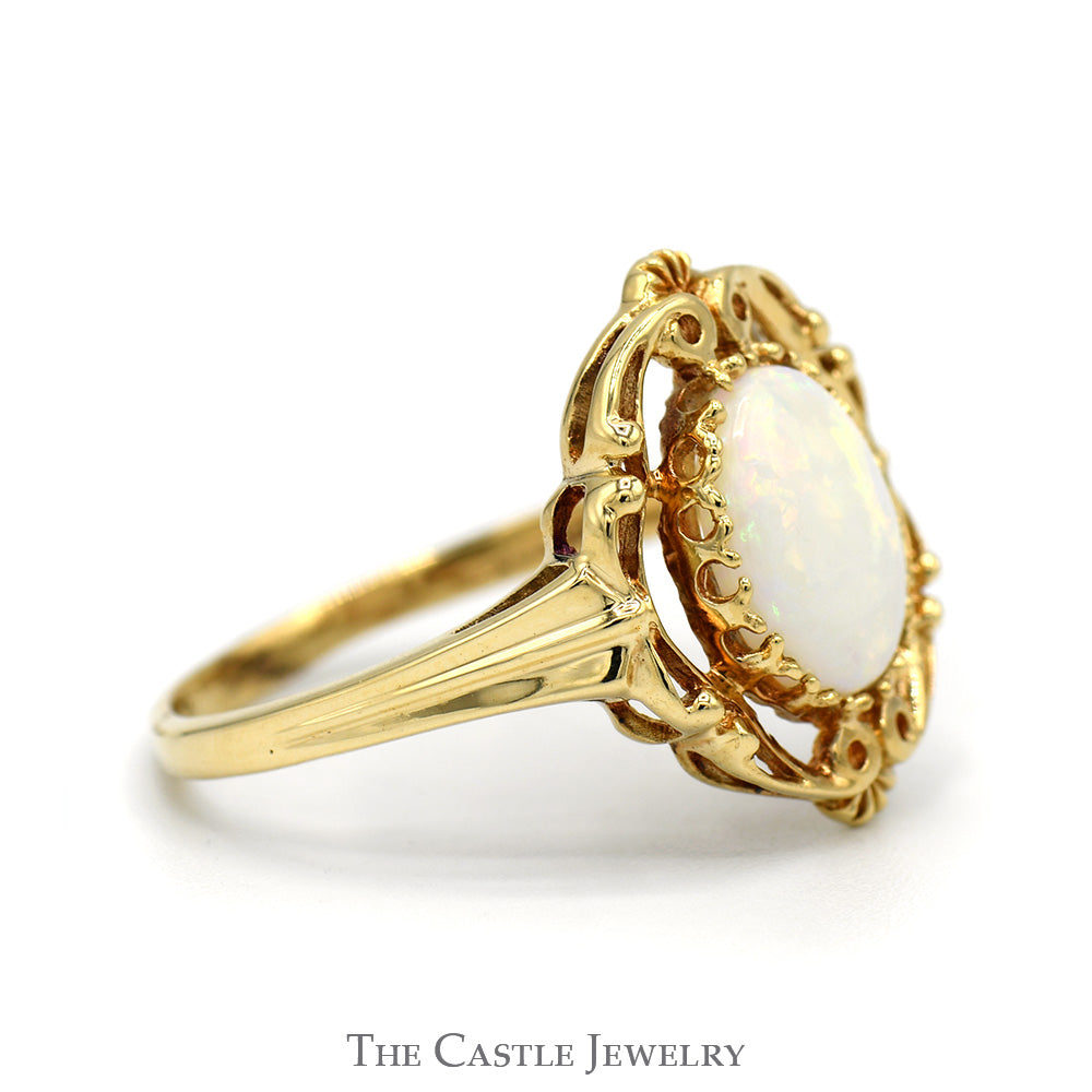 Oval Cut Opal Ring in 10k Yellow Gold Open Antique Style Mounting