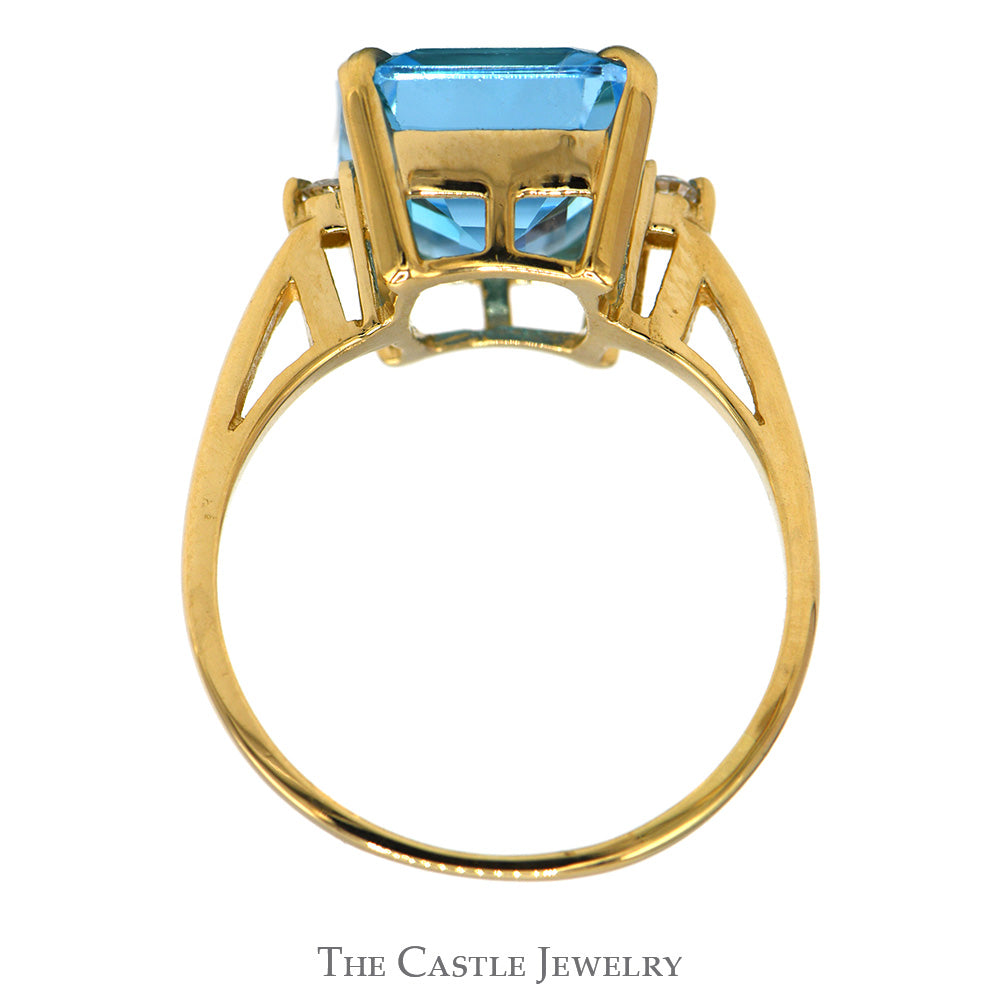 Emerald Cut Blue Topaz Ring with Round Diamond Accented Sides in 14k Yellow Gold