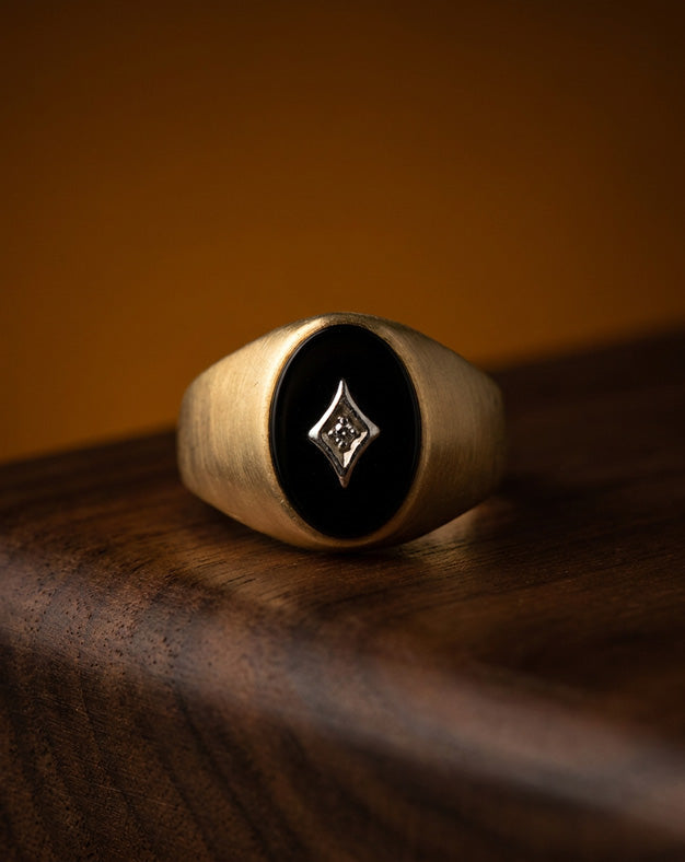 Men's Oval Black Onyx Ring with Diamond Accent in 10k Yellow Gold