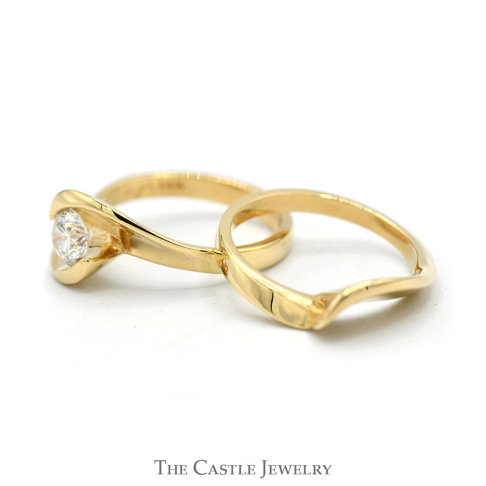 .65ct Diamond Solitaire Bridal Set with Swirled Mounting and Matching Band in 14k Yellow Gold