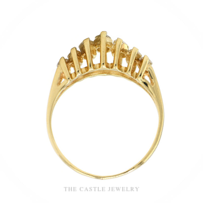 Front-facing view of the 14k yellow gold 7-stone marquise diamond band