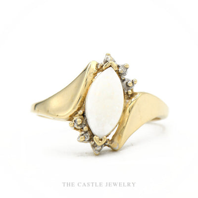10k yellow gold marquise opal ring with diamond crescent accent — top view