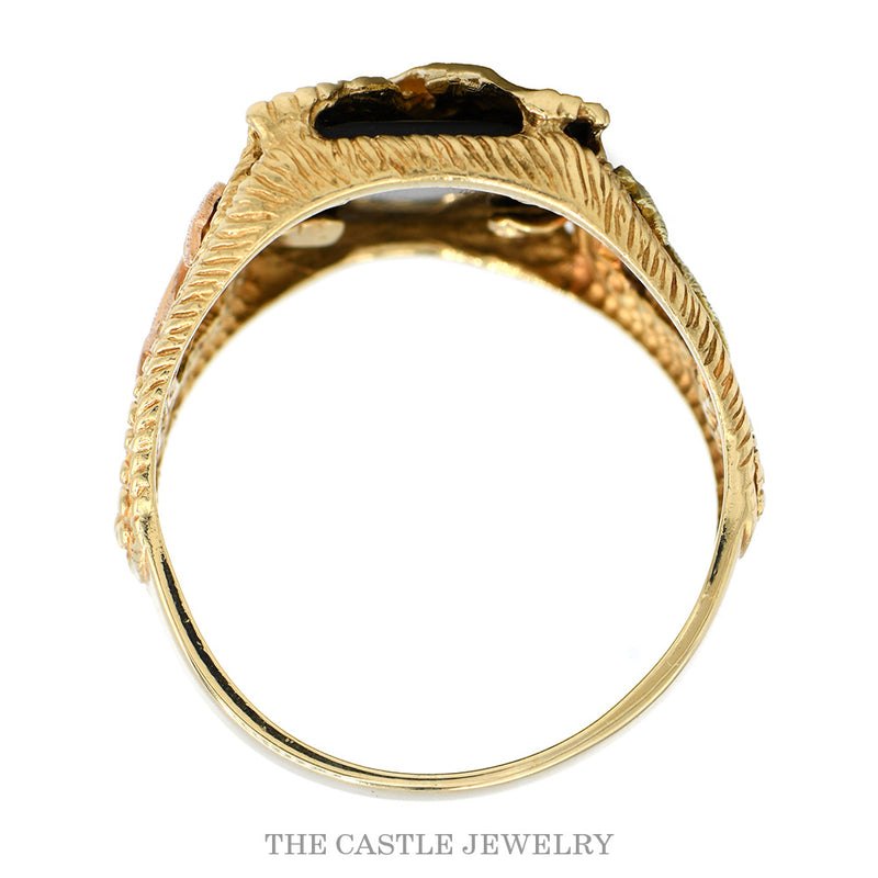 Front-facing view of the 10k BHG eagle ring with leaf accents