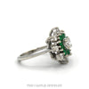 Side profile of the diamond and emerald starburst ring showing the raised open arms - Thumbnail 2