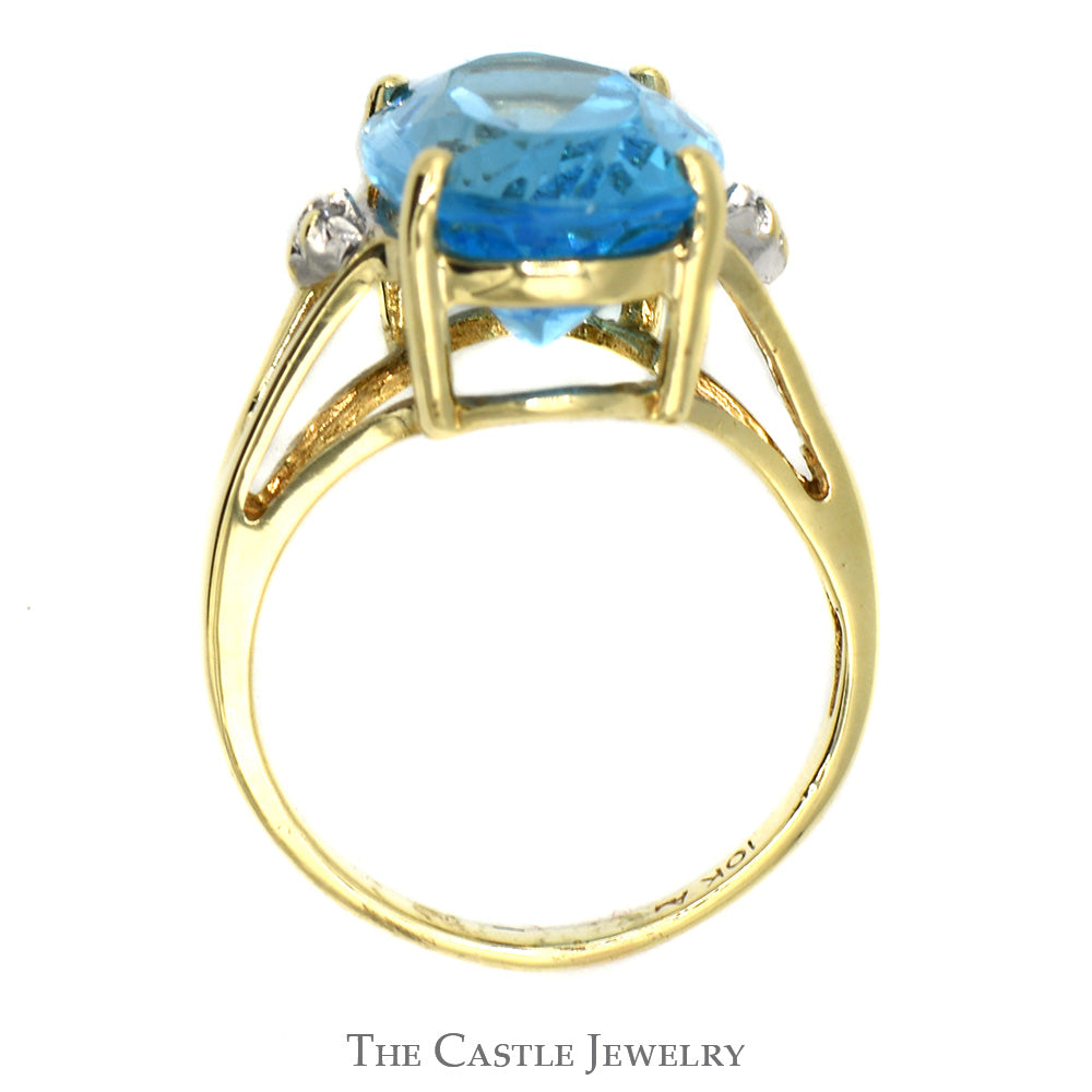 Oval Blue Topaz Ring with Diamond Accents in 10k Yellow Gold Split Shank Setting