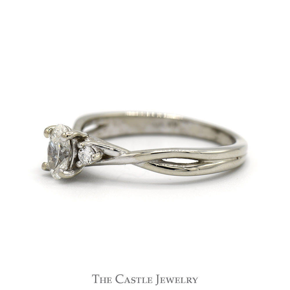 Oval Cut Diamond Engagement Ring with Round Diamond Sides in 10k White Gold Twisted Setting