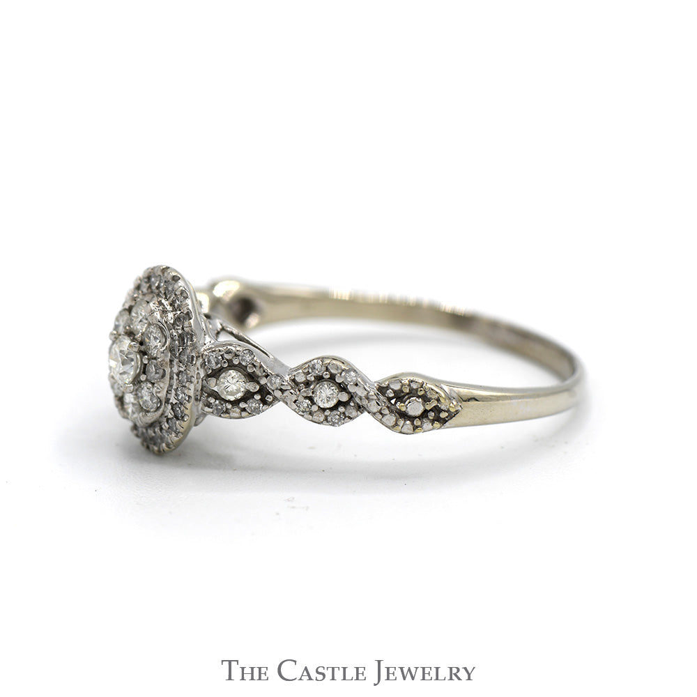 1/2cttw Oval Shaped Round Diamond Cluster Ring with Accented Twisted Sides in 10k White Gold Cathedral Mounting