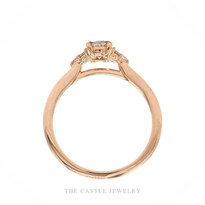 Front-facing view of the 14k rose gold lab-grown 0.64ctw oval diamond ring with shoulder clusters