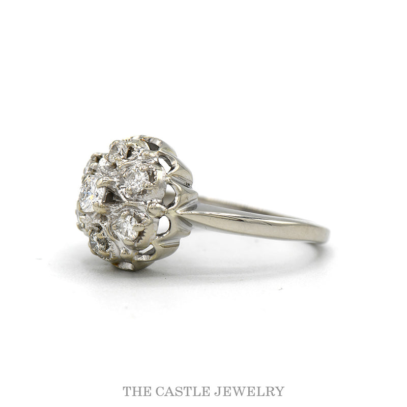 Side profile of the 14k white gold flower cluster ring showing the domed head and tapered shank