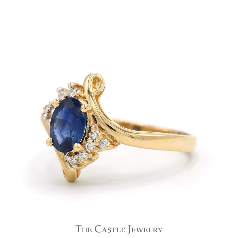 Oval Cut Sapphire Ring with Diamond Accents in 14k Yellow Gold Bypass Mounting