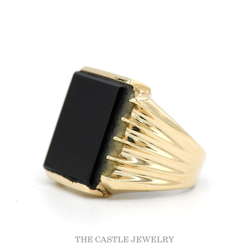 Side profile of the 10k yellow gold rectangular black onyx ring showing band taper and bezel depth
