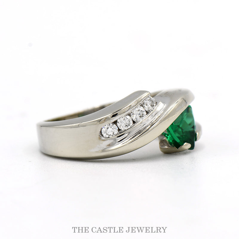 Side profile of the 14k white gold emerald bypass ring