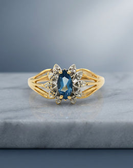 Marquise Blue Topaz Ring with 0.05ctw Diamond Accents in 14k Yellow Gold