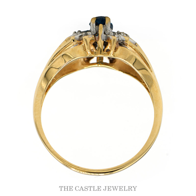 Front-facing view of the 14k yellow gold marquise topaz diamond ring