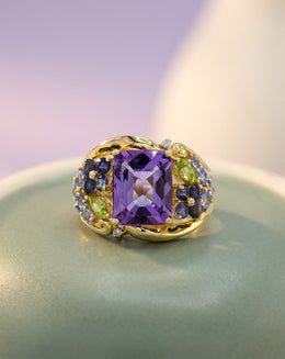 Emerald Cut Amethyst Ring with Multi Gem Flower Design Sides in 14k Yellow Gold