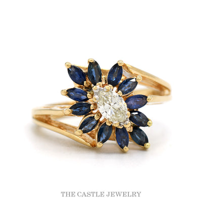 14k yellow gold oval diamond and sapphire starburst cluster ring — top view