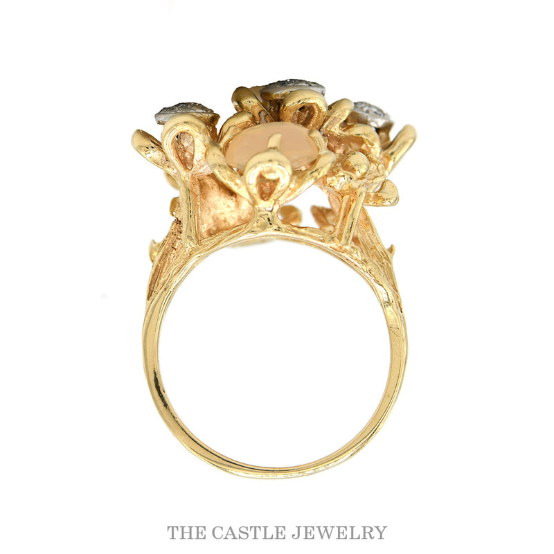 Front-facing view of the 14k yellow gold jelly opal cluster ring