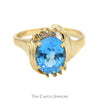 Oval Blue Topaz Ring with Diamond Accented Bypass Mounting in 14k Yellow Gold - Thumbnail 1