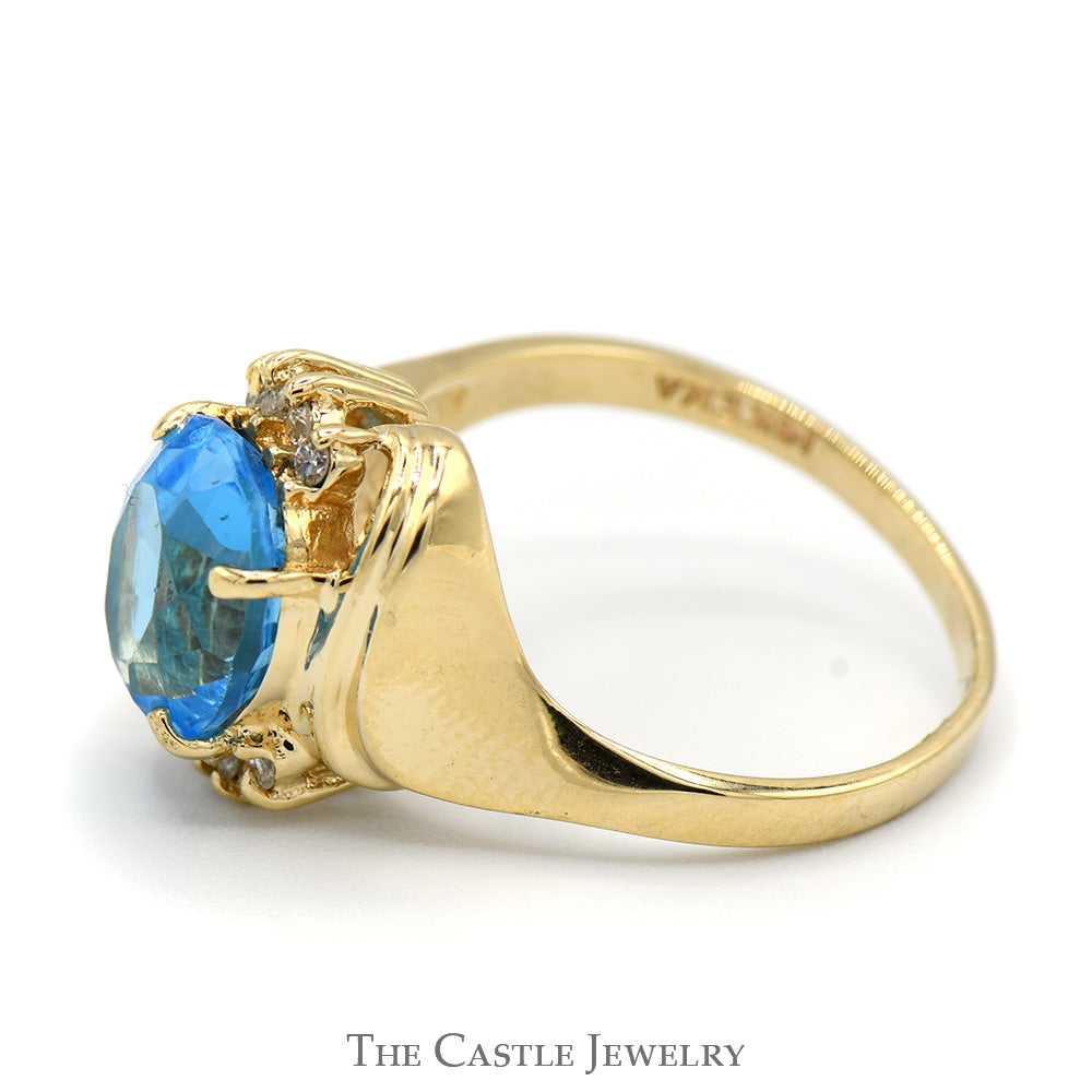 Oval Blue Topaz Ring with Diamond Accented Bypass Mounting in 14k Yell ...