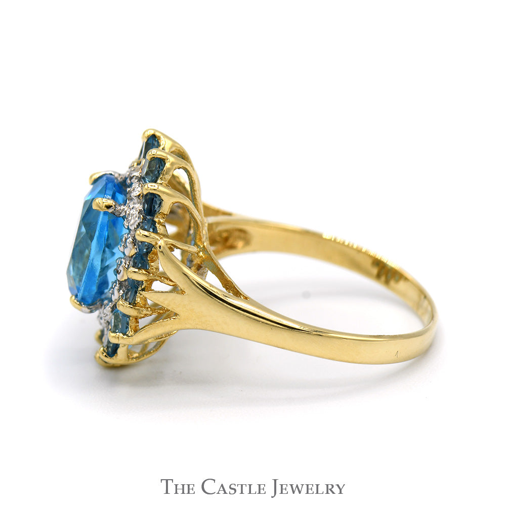 Oval Blue Topaz Ring with Blue Topaz & Diamond Halo in 14k Yellow Gold