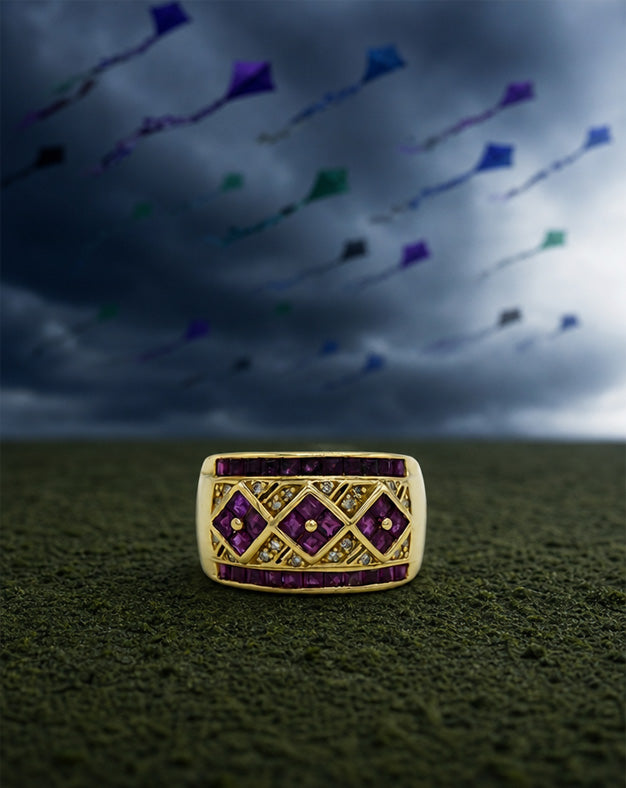 Wide Ruby Band with Three Diamond Shaped Ruby Panels, Channel Set Ruby Edges and .10cttw Diamond Accents in 14k Yellow Gold