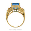 Front-facing view of the 14k yellow gold emerald cut blue topaz ring - Thumbnail 3