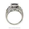 Front-facing view of the cushion cut tanzanite ring with a milgrained diamond halo and leaf designed sides in 14k white gold - Thumbnail 3