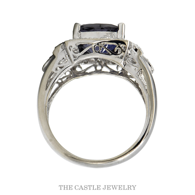 Front-facing view of the cushion cut tanzanite ring with a milgrained diamond halo and leaf designed sides in 14k white gold