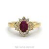 Oval ruby ring with .38cttw double diamond halo in 14k yellow gold — top view - Thumbnail 1