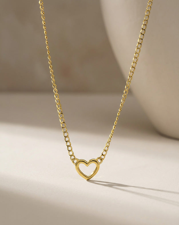 18.5 Inch Open Heart Necklace on Curb Link Chain in 10k Yellow Gold — lifestyle photography