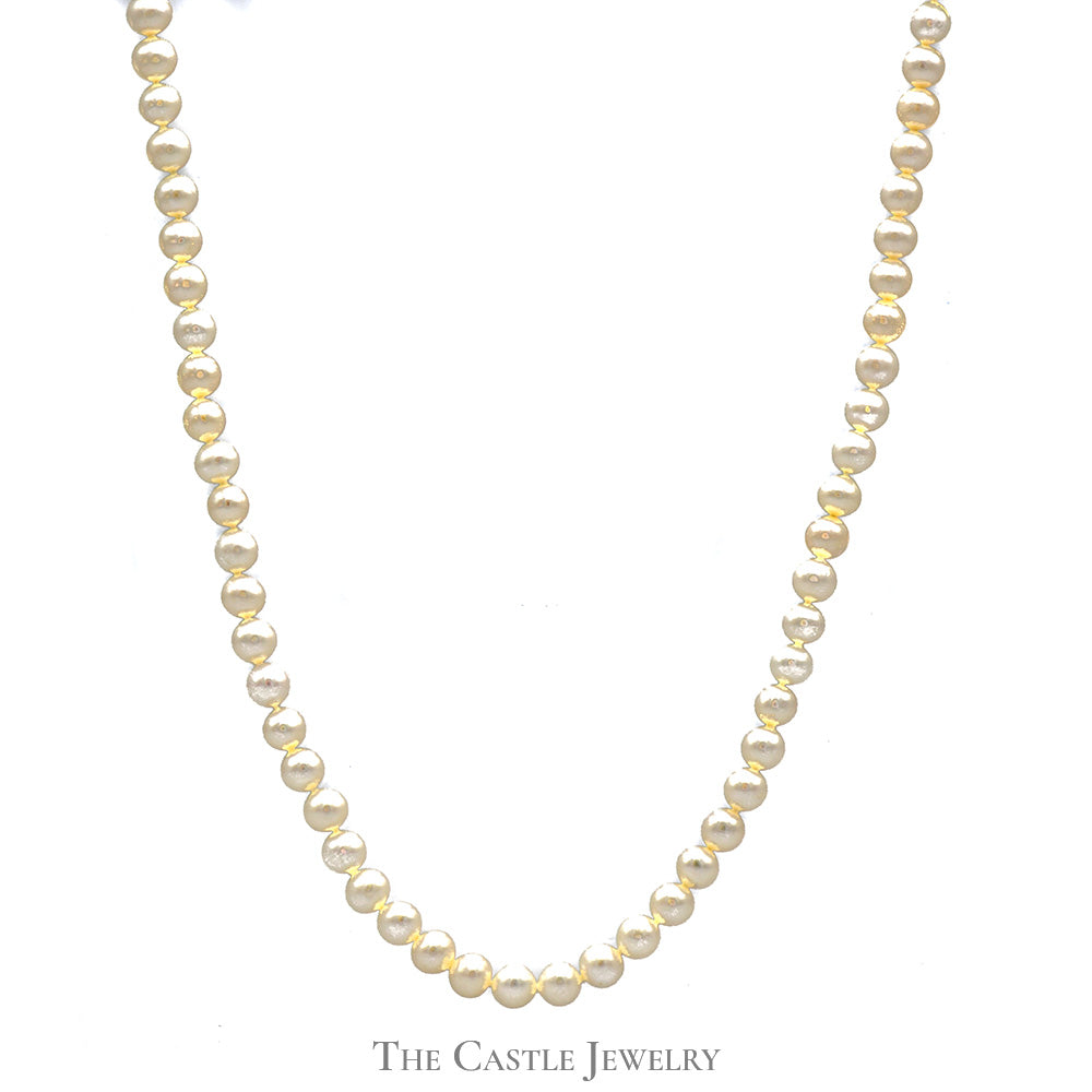 24 inch Strand of 6.5-7mm White Pearls with 14k Yellow Gold Clasp