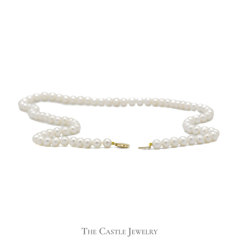 24 inch Strand of 6.5-7mm White Pearls with 14k Yellow Gold Clasp