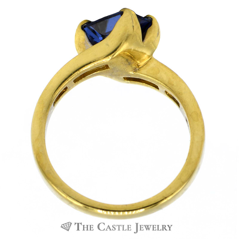 Emerald Cut Tanzanite Ring with Diamond Band in 18K Yellow Gold
