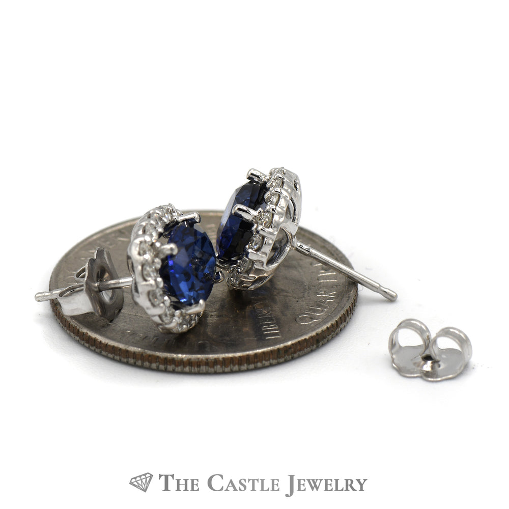 Diffused Oval Sapphire Earrings with Diamond Halo in 14k White Gold