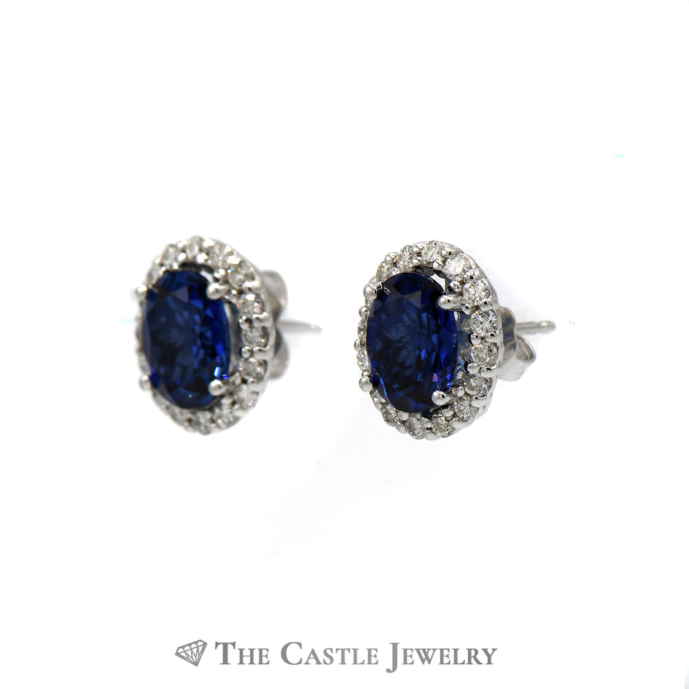 Diffused Oval Sapphire Earrings with Diamond Halo in 14k White Gold