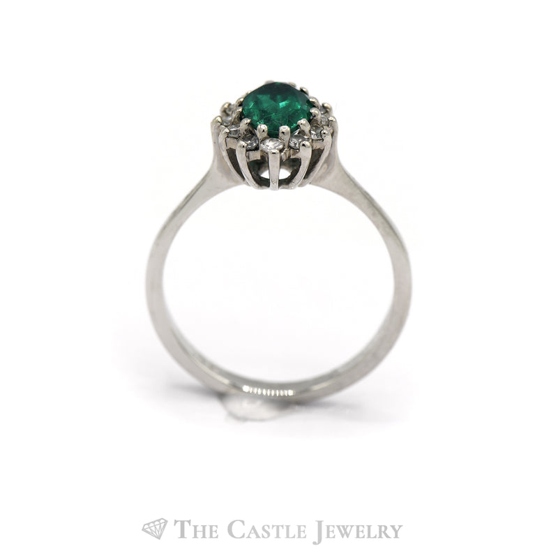 Oval Emerald with Diamond Halo Ring in 14KT White Gold