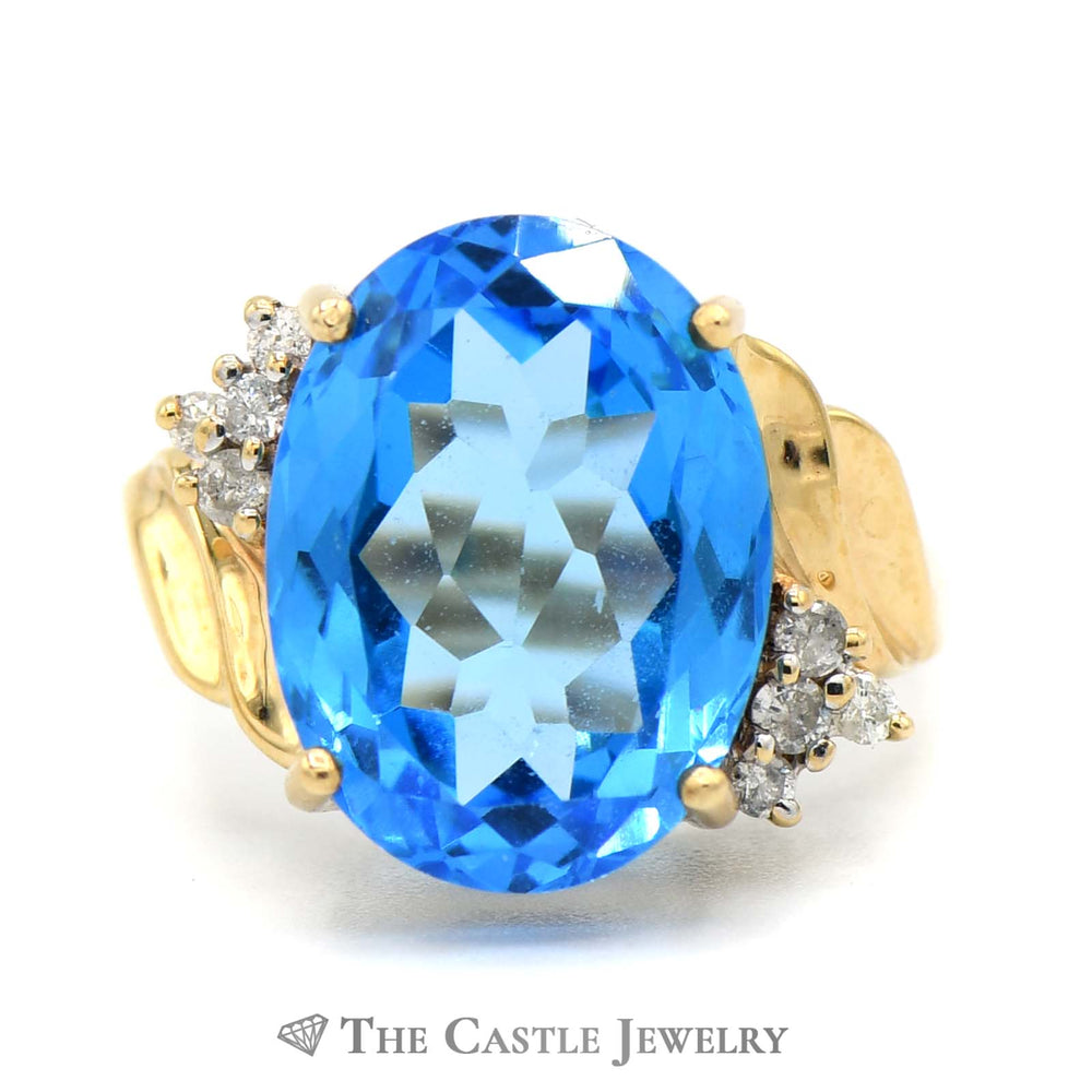 Oval Blue Topaz Ring with Diamond Accents in 10k Yellow Gold