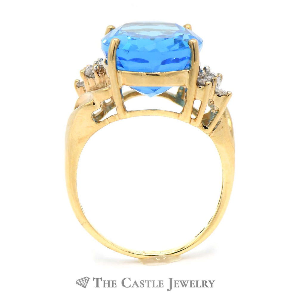 Oval Blue Topaz Ring with Diamond Accents in 10k Yellow Gold