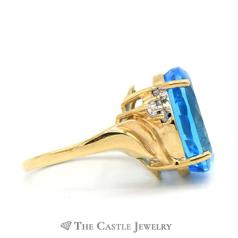 Oval Blue Topaz Ring with Diamond Accents in 10k Yellow Gold