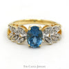 Oval Blue Topaz Ring with Diamond Accented Leaf Design in 14k Yellow Gold - Thumbnail 1