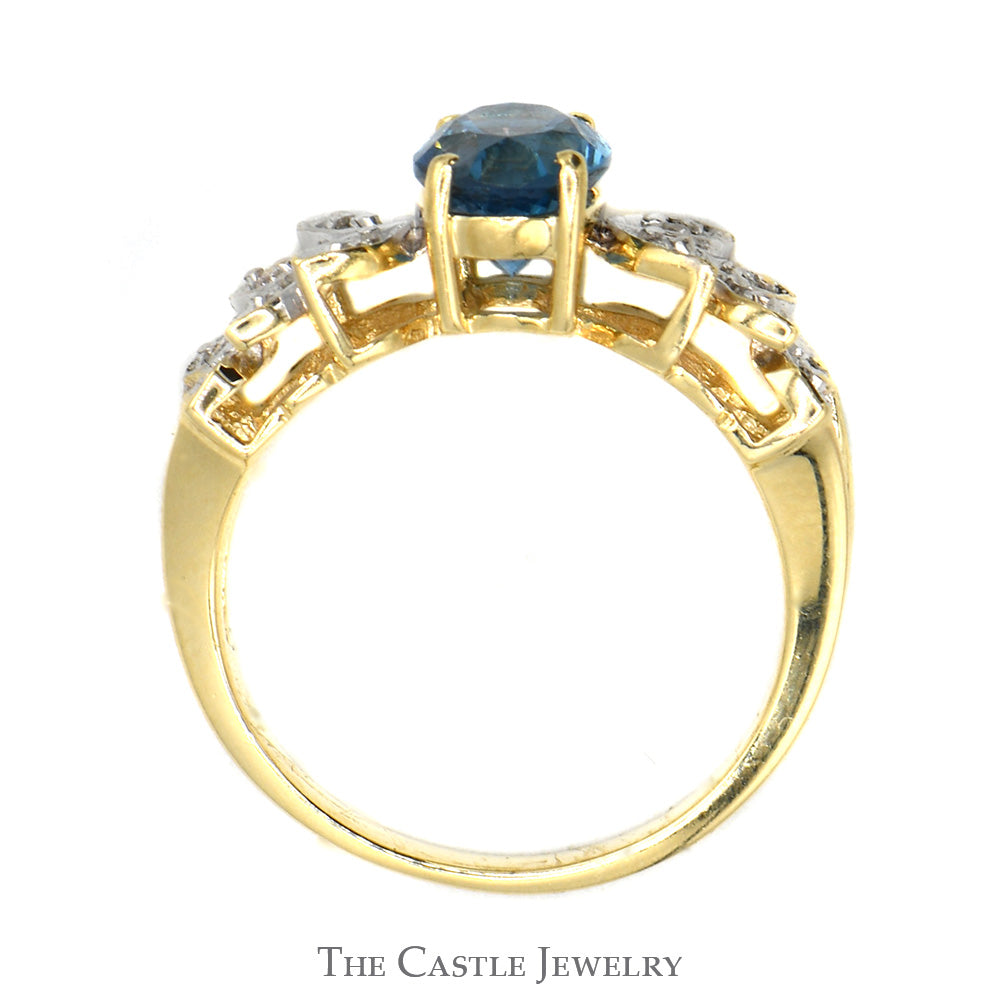 Oval Blue Topaz Ring with Diamond Accented Leaf Design in 14k Yellow Gold