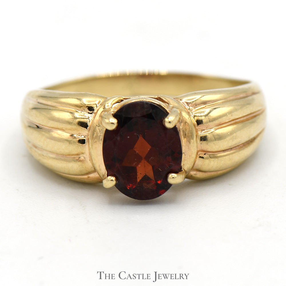 Oval Garnet Ring with Ridged Sides in 10k Yellow Gold