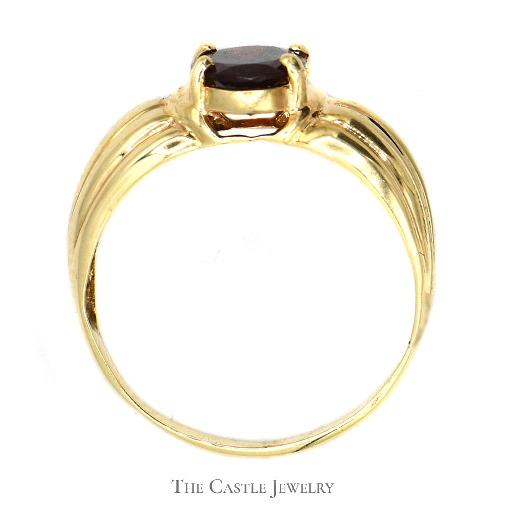 Oval Garnet Ring with Ridged Sides in 10k Yellow Gold