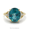 Oval Blue Nile Topaz Ring with Illusion Set Diamond Accents in 10k Yellow Gold - Thumbnail 1