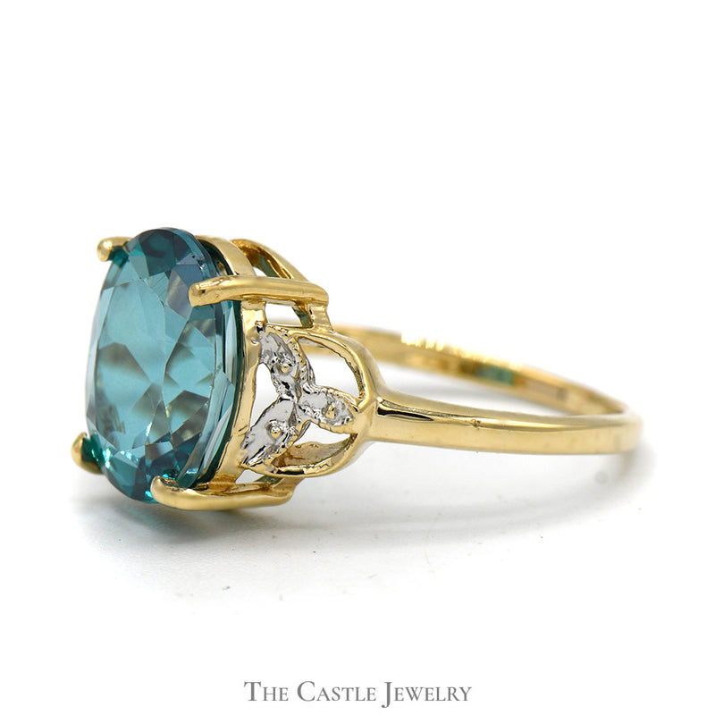 Oval Blue Nile Topaz Ring with Illusion Set Diamond Accents in 10k Yellow Gold