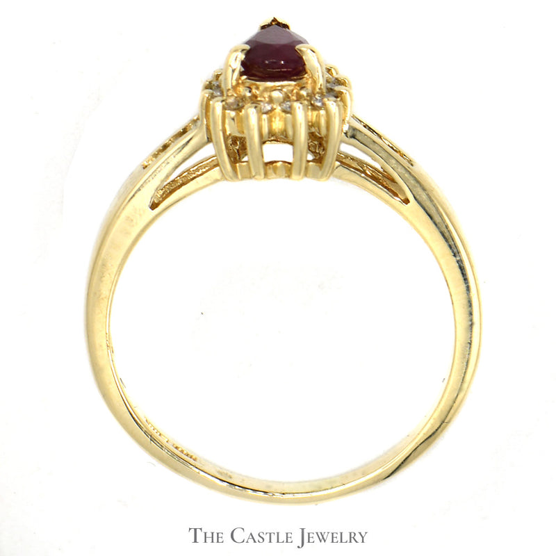 Pear Cut Ruby Ring with Diamond Halo and Channel Set Diamond Accents in 14k Yellow Gold