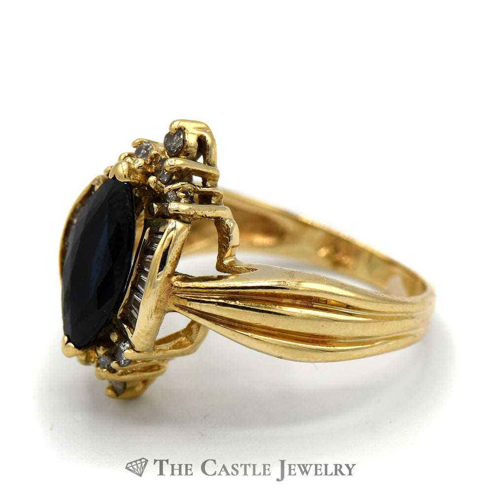 Marquise Shaped Sapphire Ring with Baguette and Round Diamond Accents in 14k Yellow Gold