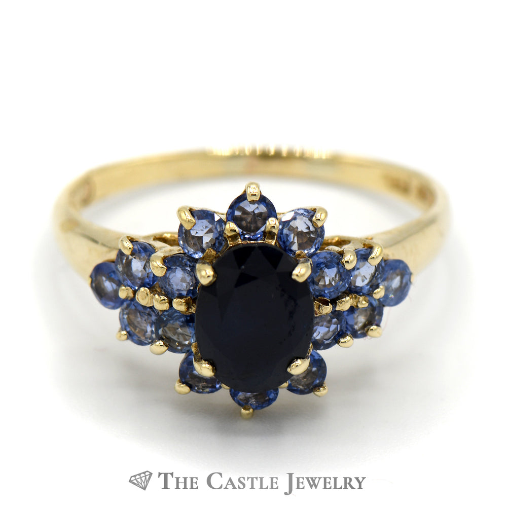 Oval Sapphire Ring with Tanzanite Cluster Sides in 10k Yellow Gold
