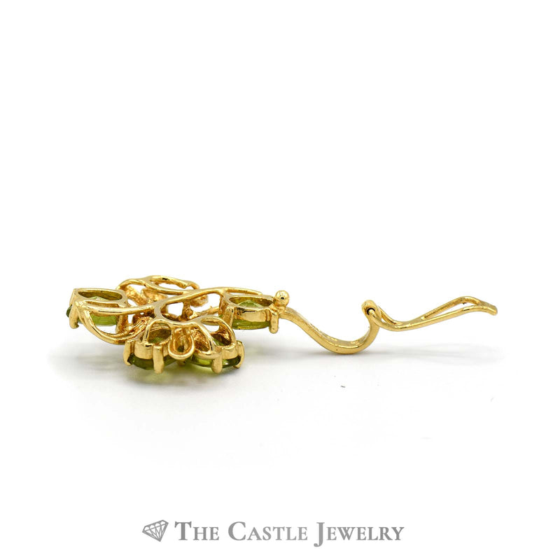 Oval Peridot Cluster Pendant with Open Floral Design in 14k Yellow Gold