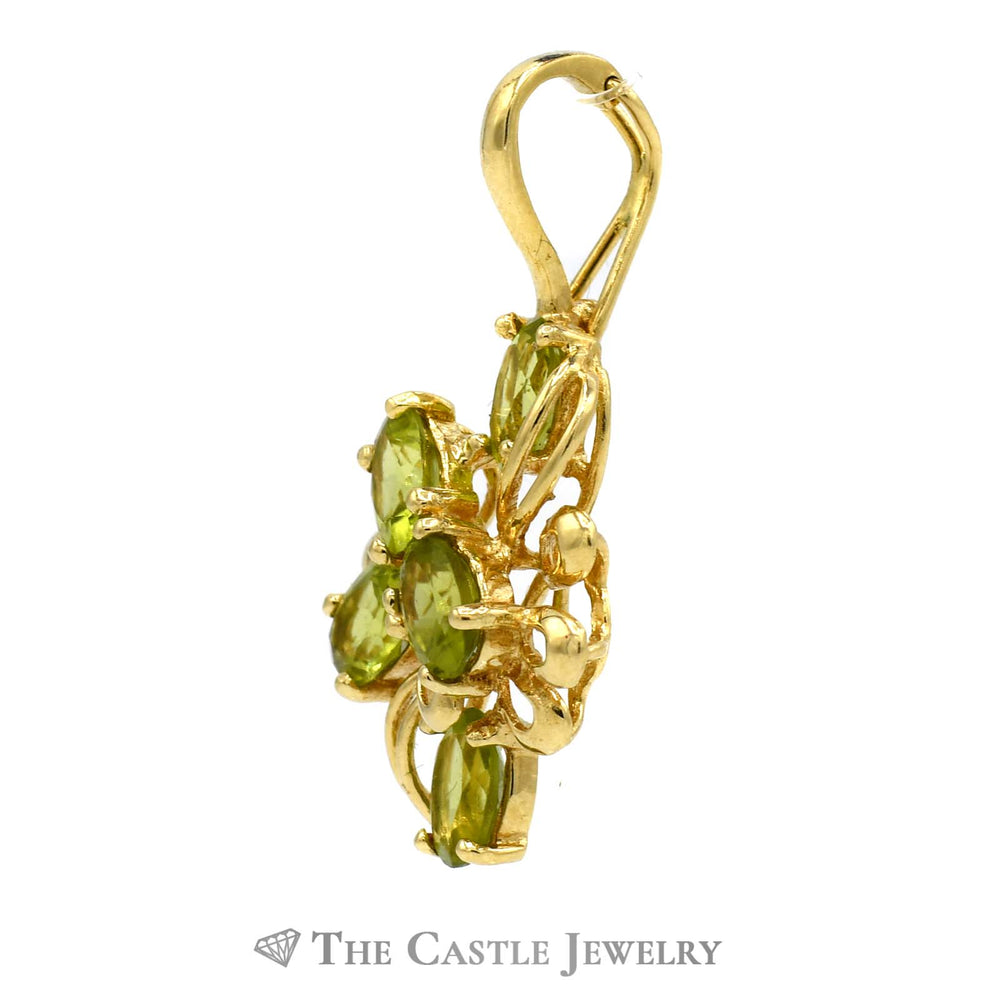 Oval Peridot Cluster Pendant with Open Floral Design in 14k Yellow Gold